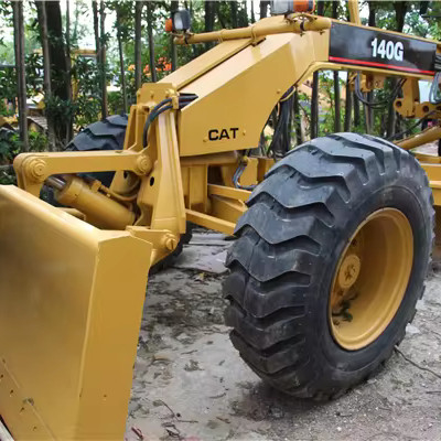 Calificador de motor de ruedas CAT 140K original con bajas horas de trabajo y motor Cummins