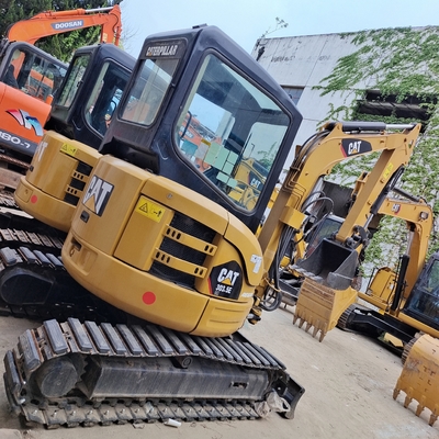 Calzado de segunda mano de excavadora Caterpillar en buen estado