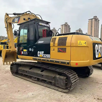 Excavadora con cilindro hidráulico CAT 325D en excelente estado.